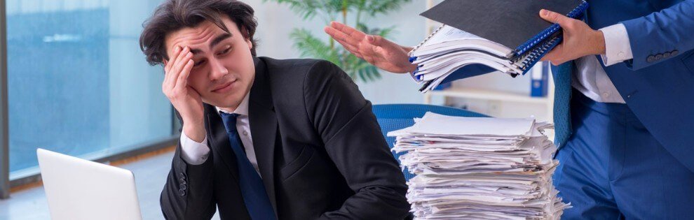man stressed at workload